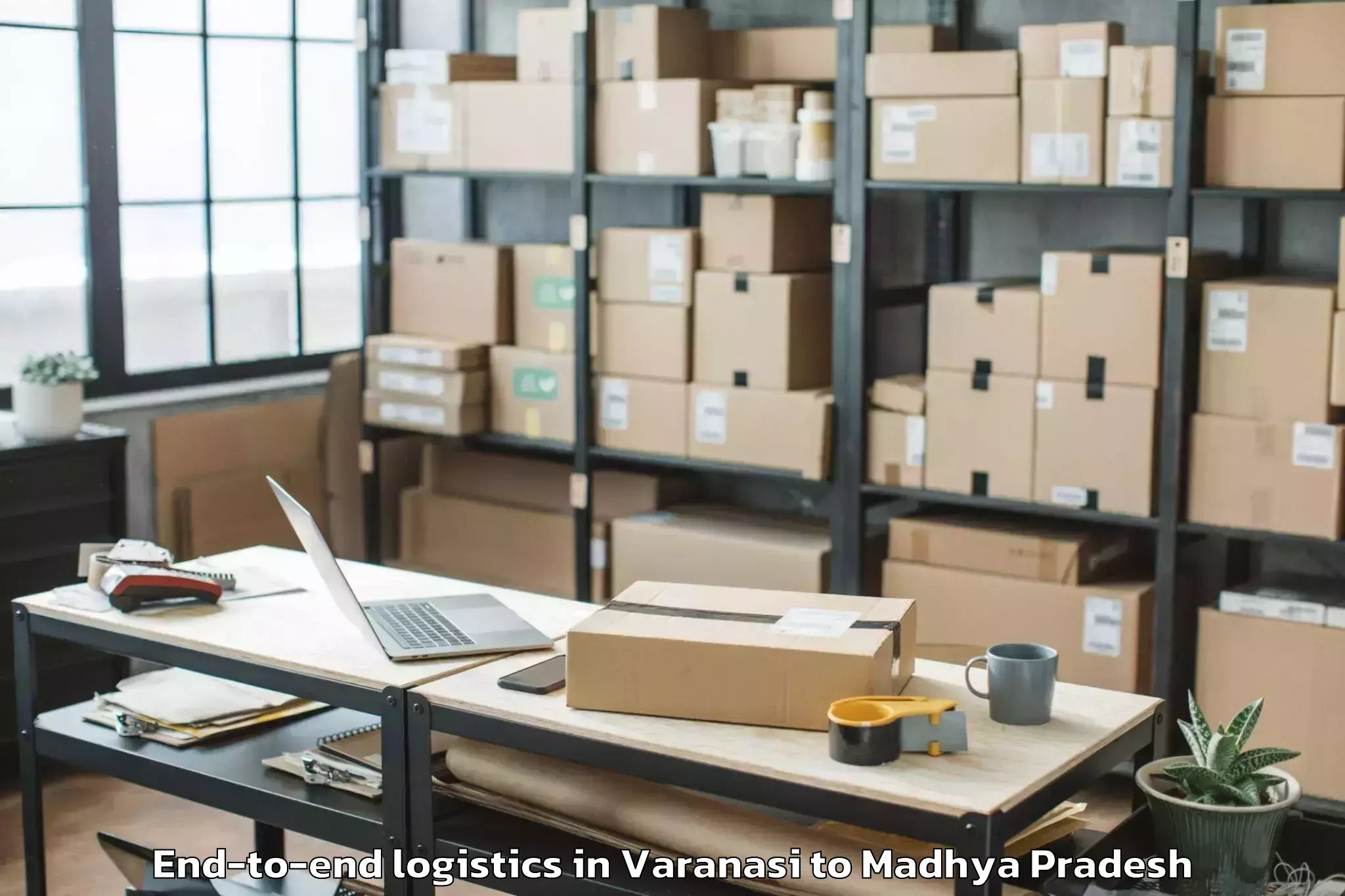 Get Varanasi to Harpalpur End To End Logistics